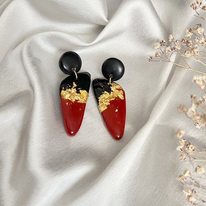 Glossy red chilli-shaped statement earrings