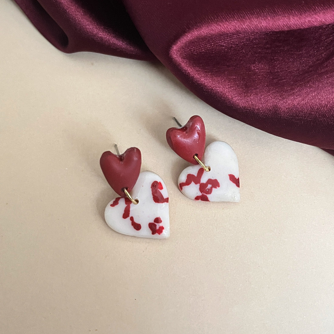 Handmade split heart polymer clay earrings