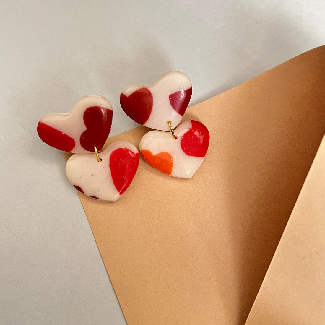 Polka dot double heart clay earrings