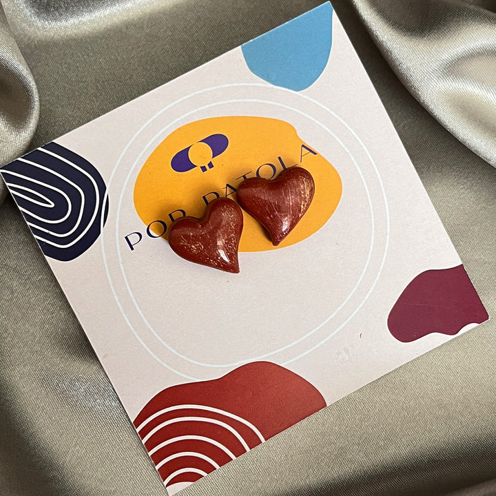 Shiny heart-shaped stud earrings