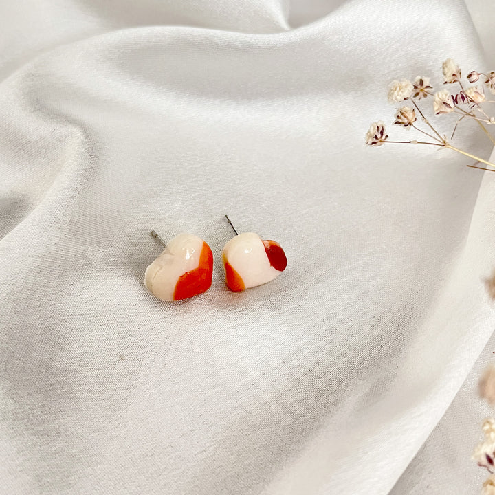 Small mismatched heart clay earrings