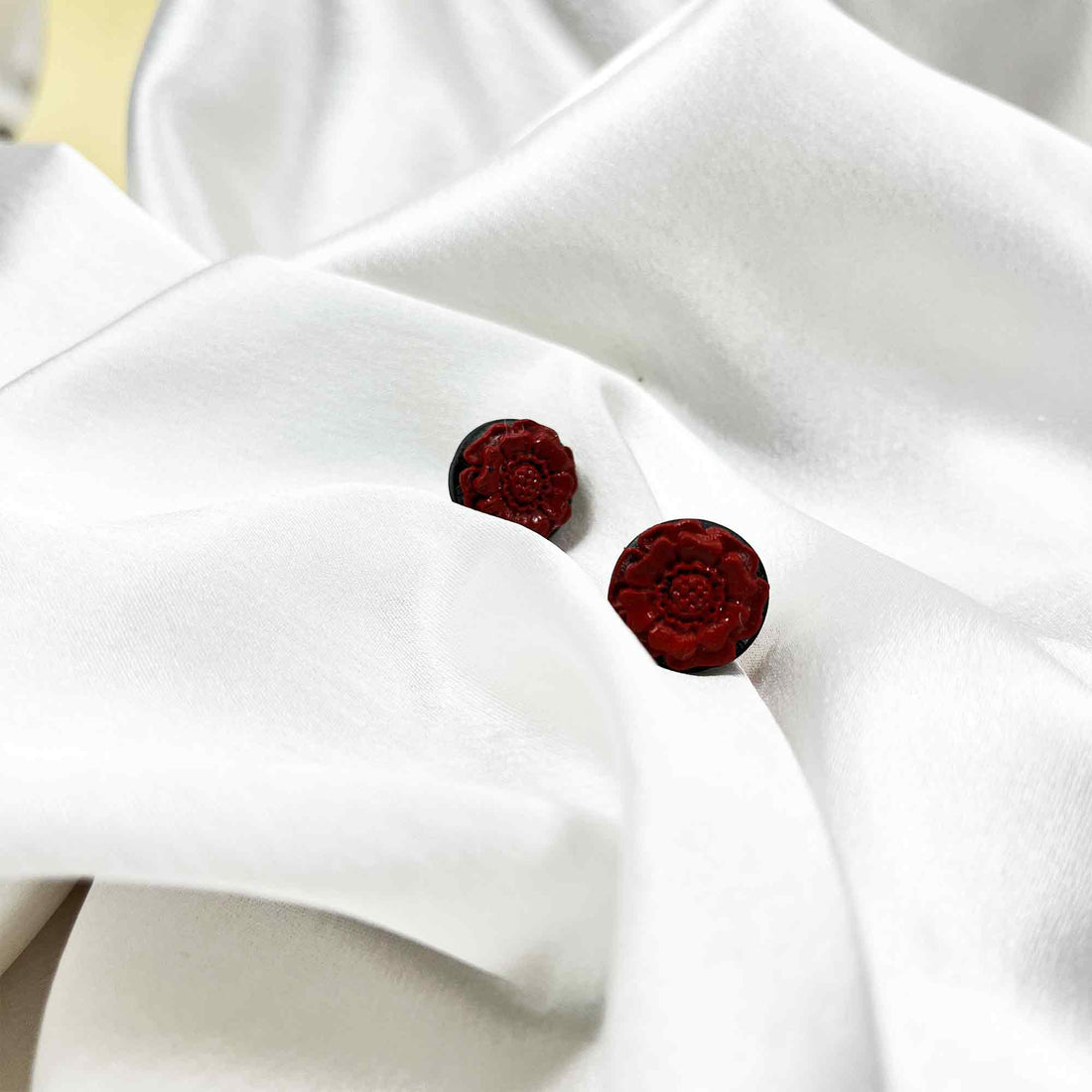 Handmade rust red floral stud earrings