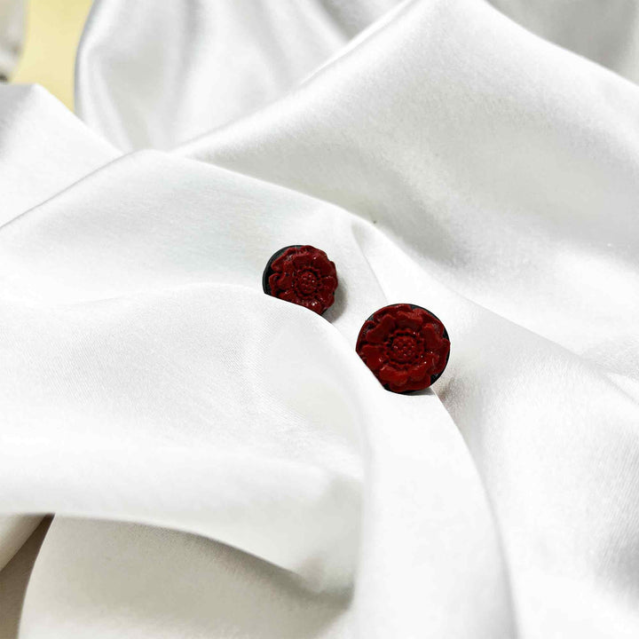 Handmade rust red floral stud earrings