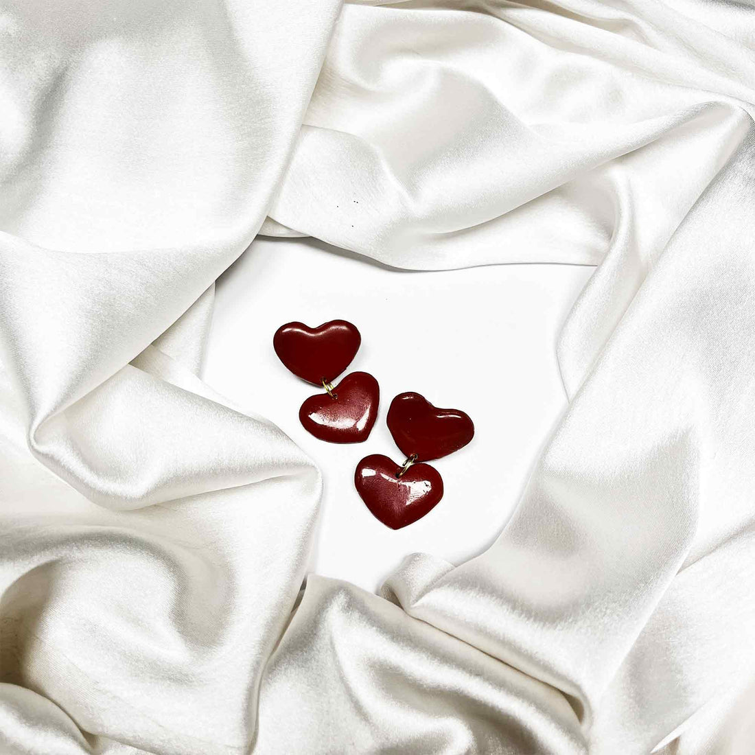 Lightweight heart-shaped clay earrings