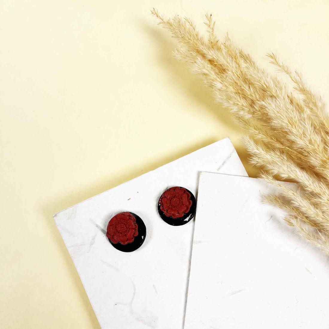 Artistic floral earrings with bold contrast